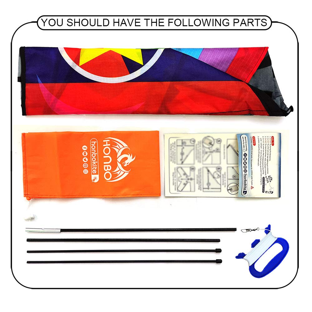 Honbo family on the beach enjoys shared moments with this kite.