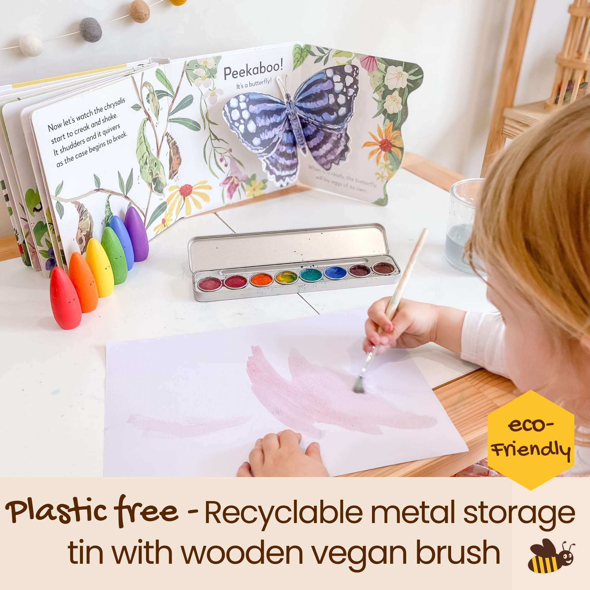 Honeysticks kid painting action showcasing vibrant colors and imagination.