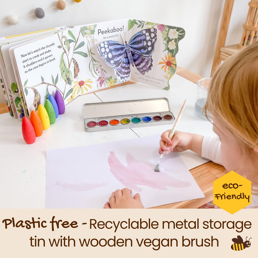 Honeysticks kid painting action showcasing vibrant colors and imagination.