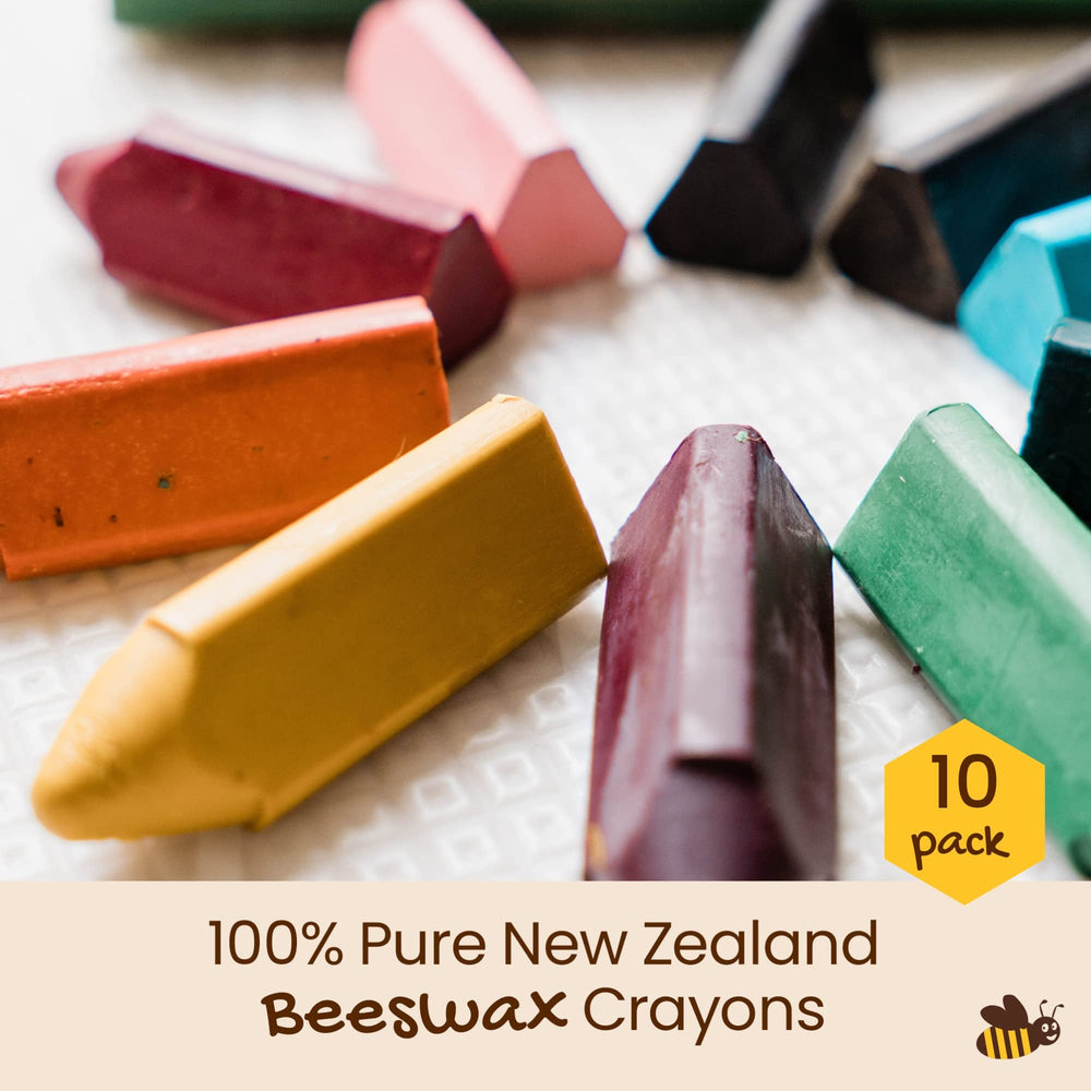 Honeysticks triangular crayons in toddler hand, easy grip promotes steady coloring.