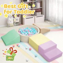 Hoohtoot children enjoying indoor playground with foam blocks and ball pit.