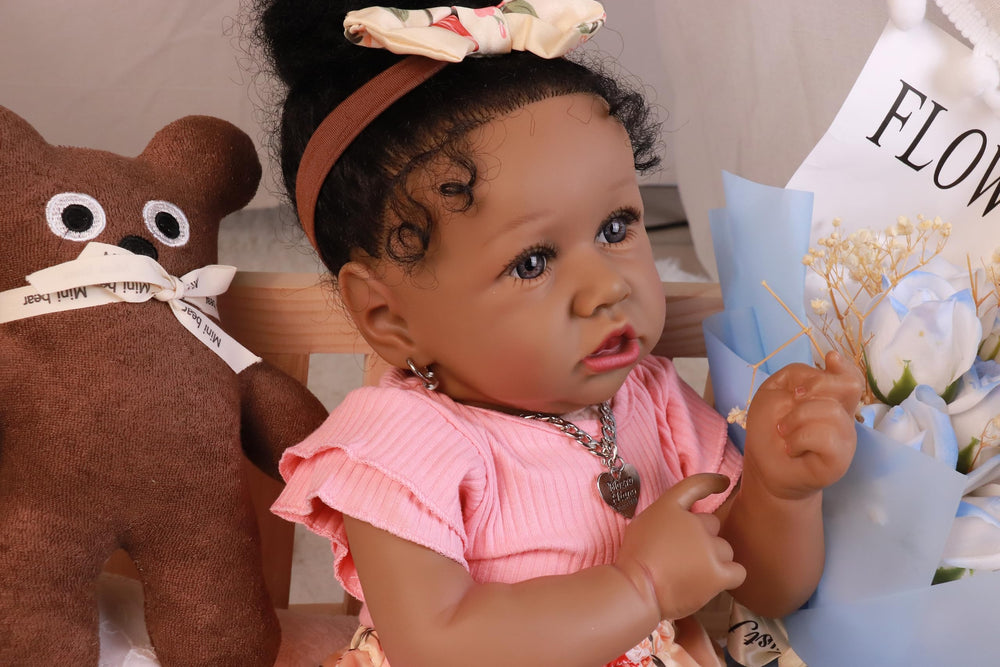 HOOMAI reborn doll with rooted hair ready for styling and pretend care.
