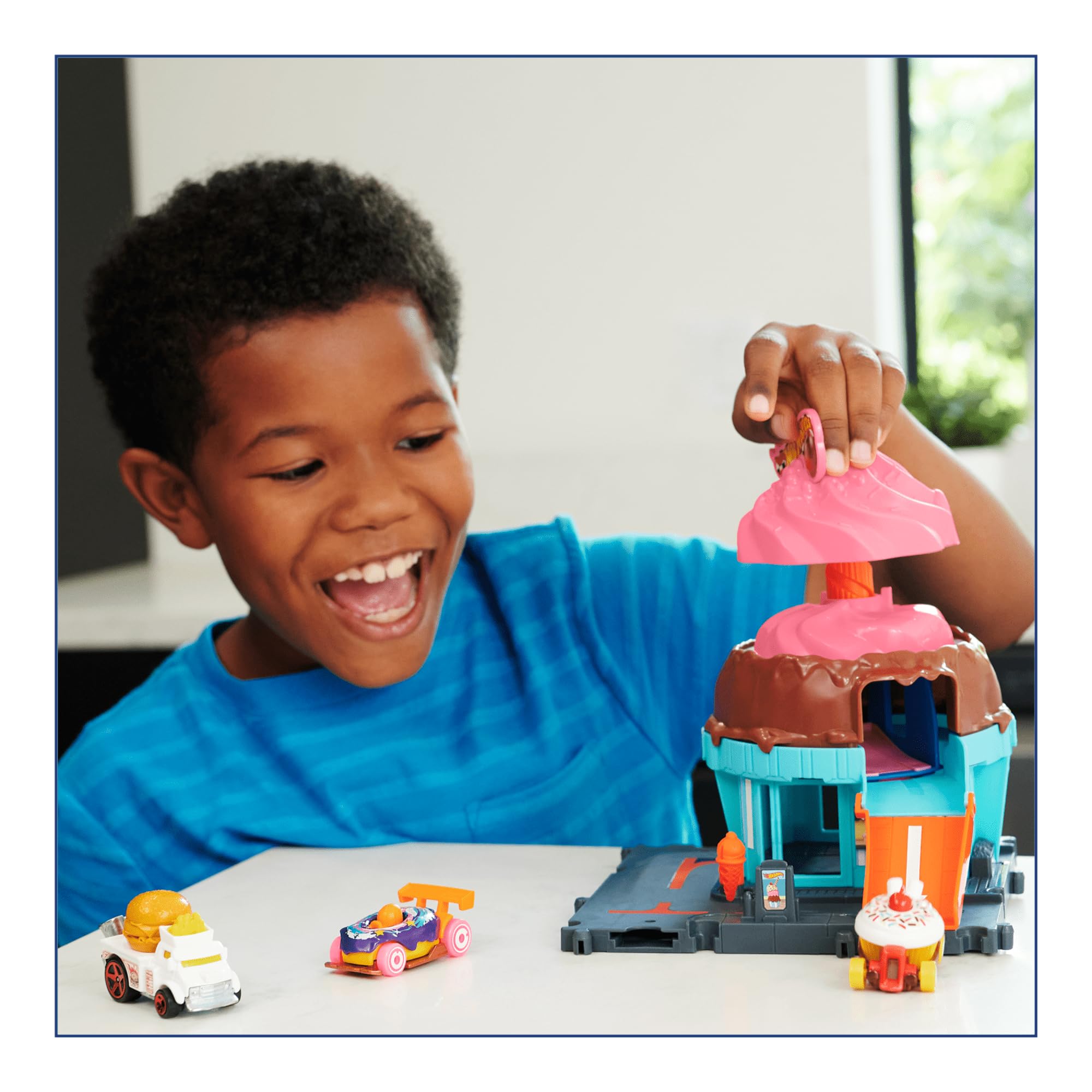 Hot Wheels city downtown ice cream swirl display for playful storytelling