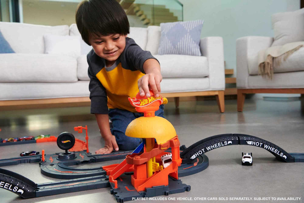 Hot Wheels drive-thru car moves through the restaurant for fast-paced play.
