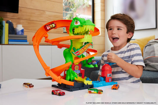 Hot Wheels City T-Rex Blaze Battle playset eyes spin as cars pass for suspenseful play