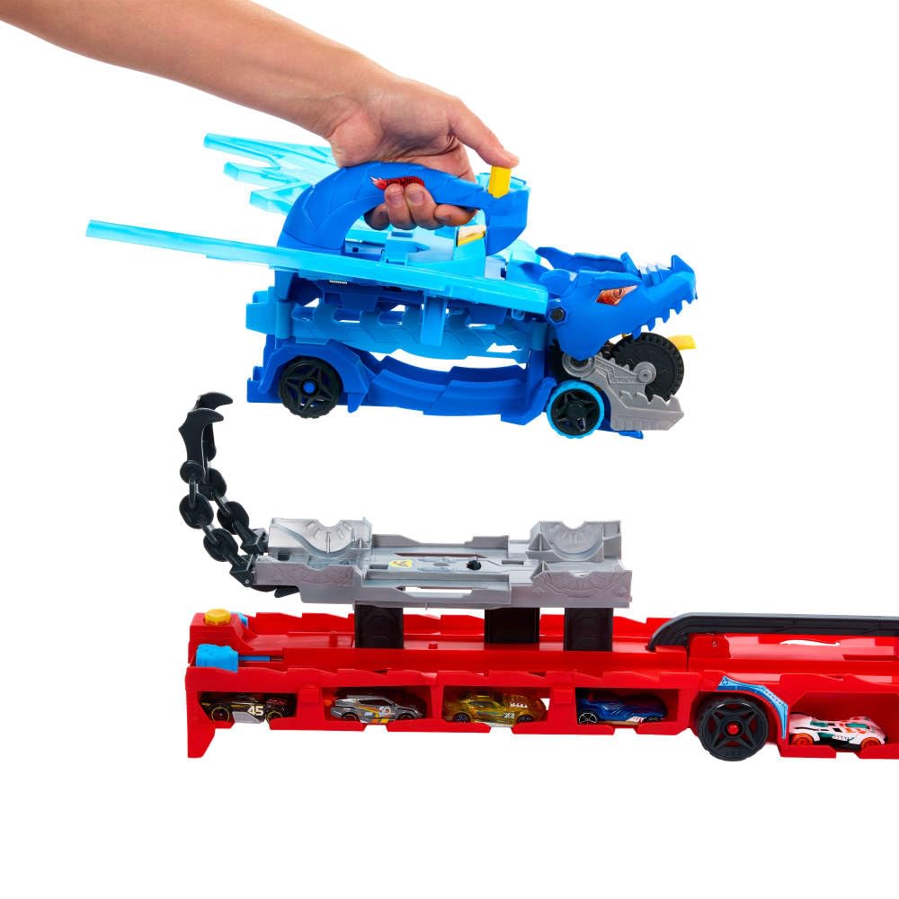 Two dragons ready for racing and eating cars in a large-scale setup