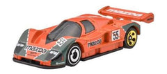Hot Wheels Mazda 787B orange finish highlights detailed body for close inspection and display.