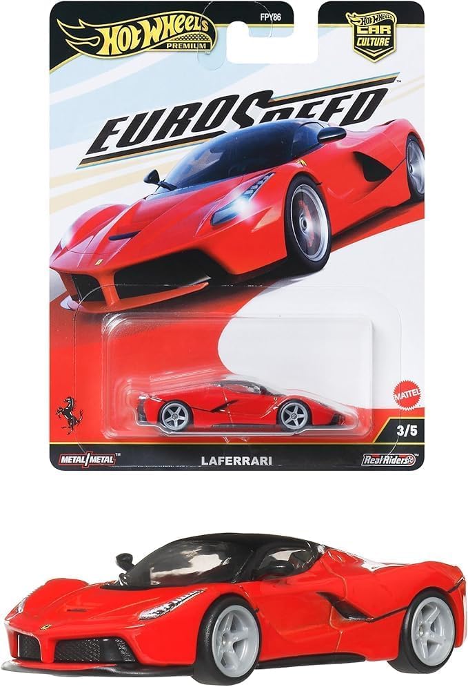 Hot Wheels Red Ferrari LaFerrari closeup reveals Rubber Real Riders for authentic feel.