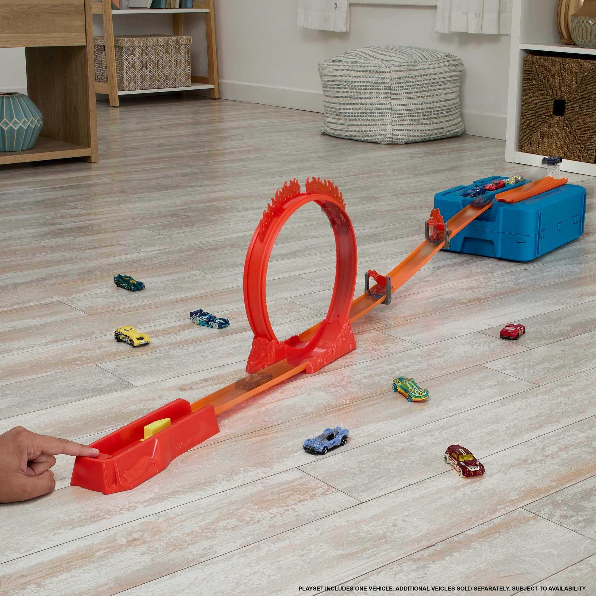 Hot Wheels Flame Stunt Pack ring of fire for daring launches and visual drama.