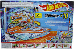 Hot Wheels 1:64 scale cars beside a ruler for size comparison to inform collectors