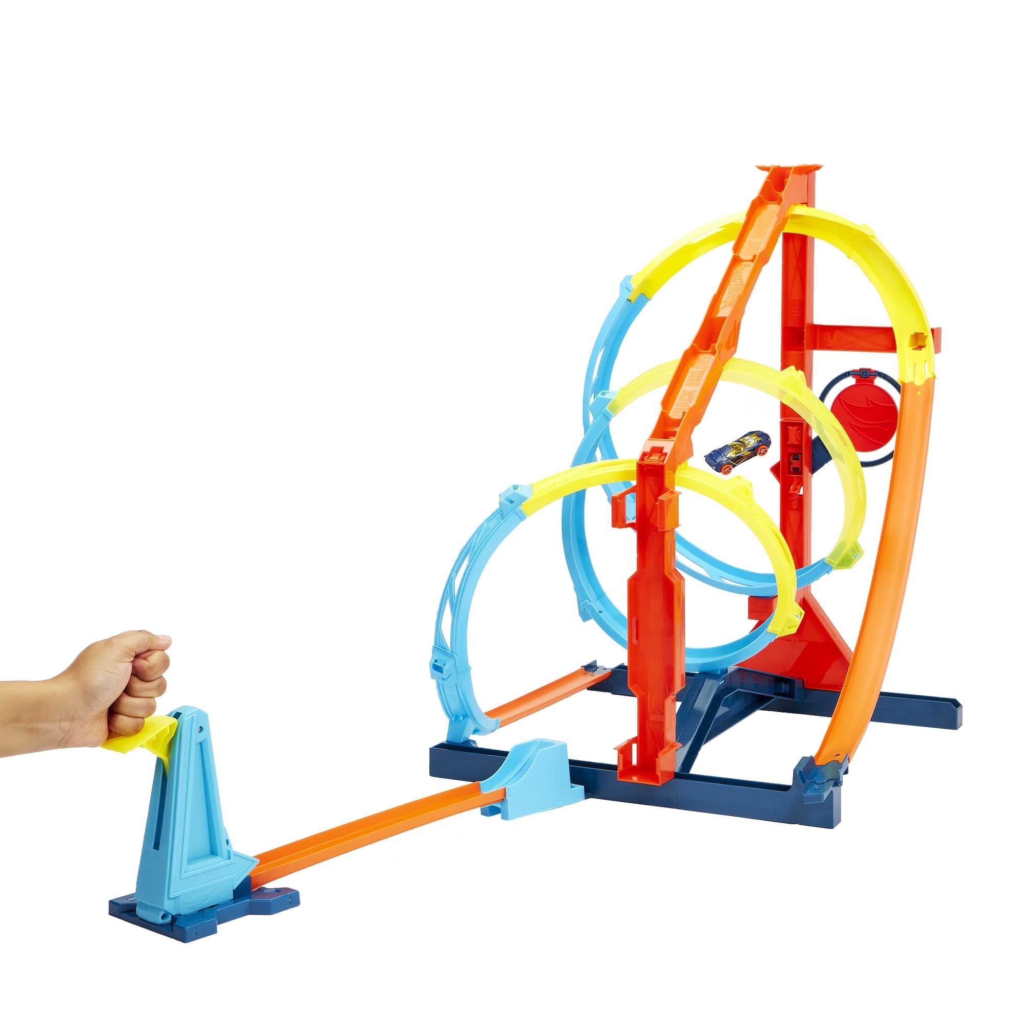 Hot Wheels launcher and target pieces neatly docked on the base