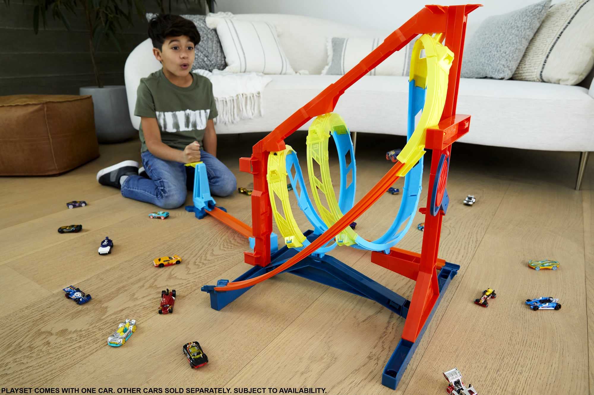 Hot Wheels corkscrew loops directing cars toward the final target