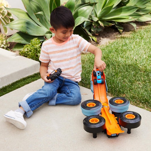 Hot Wheels Rhinomite in Dynamite Mode ready to boost 1:64 trucks.