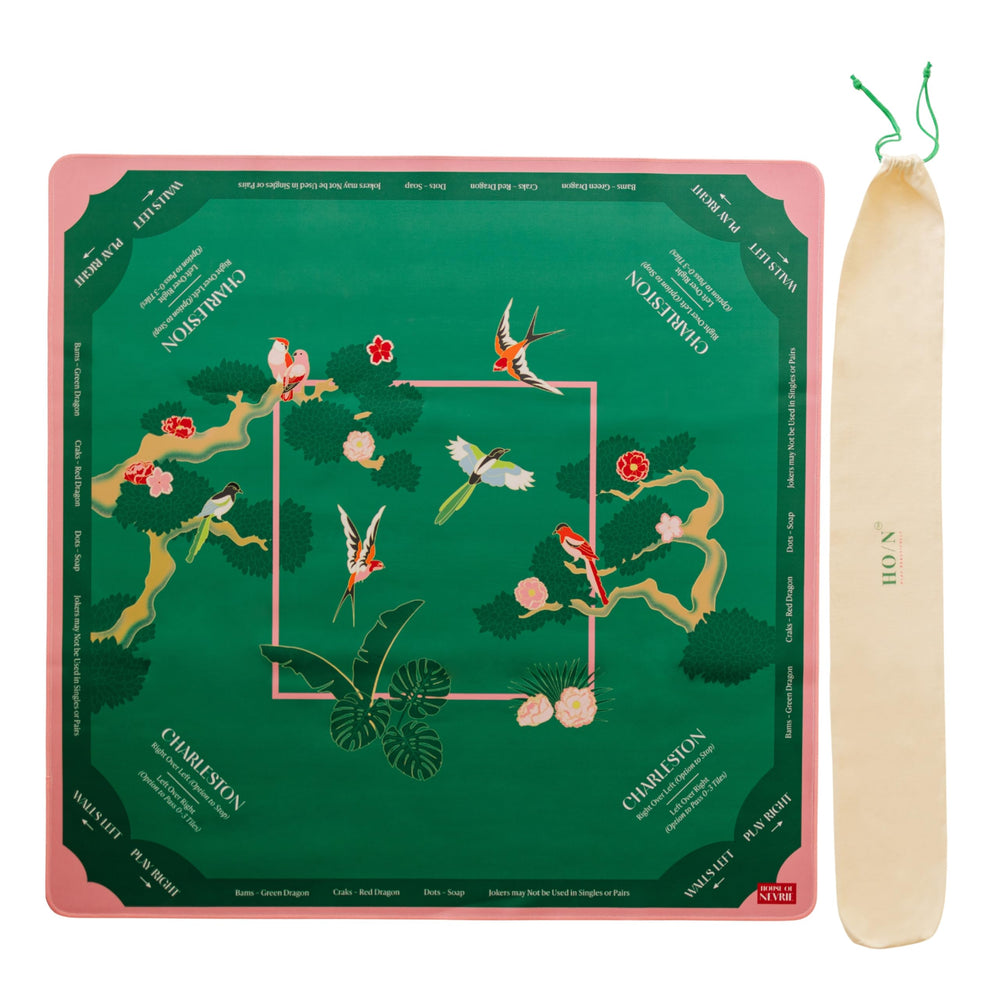 House of Nevrie Mahjong mat rolled in carry bag for travel and storage.