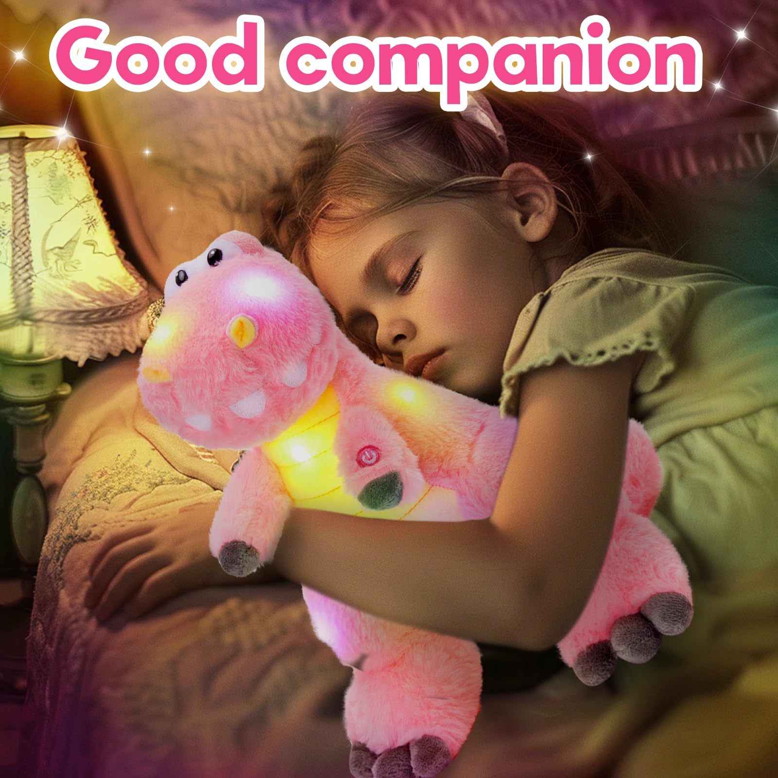 Houwsbaby cuddly pink dino plush with large expressive eyes for hugging.