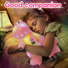 Houwsbaby cuddly pink dino plush with large expressive eyes for hugging.
