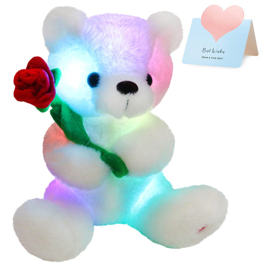 Houwsbaby Glow Teddy Bear with Rose glows softly for bedtime comfort.