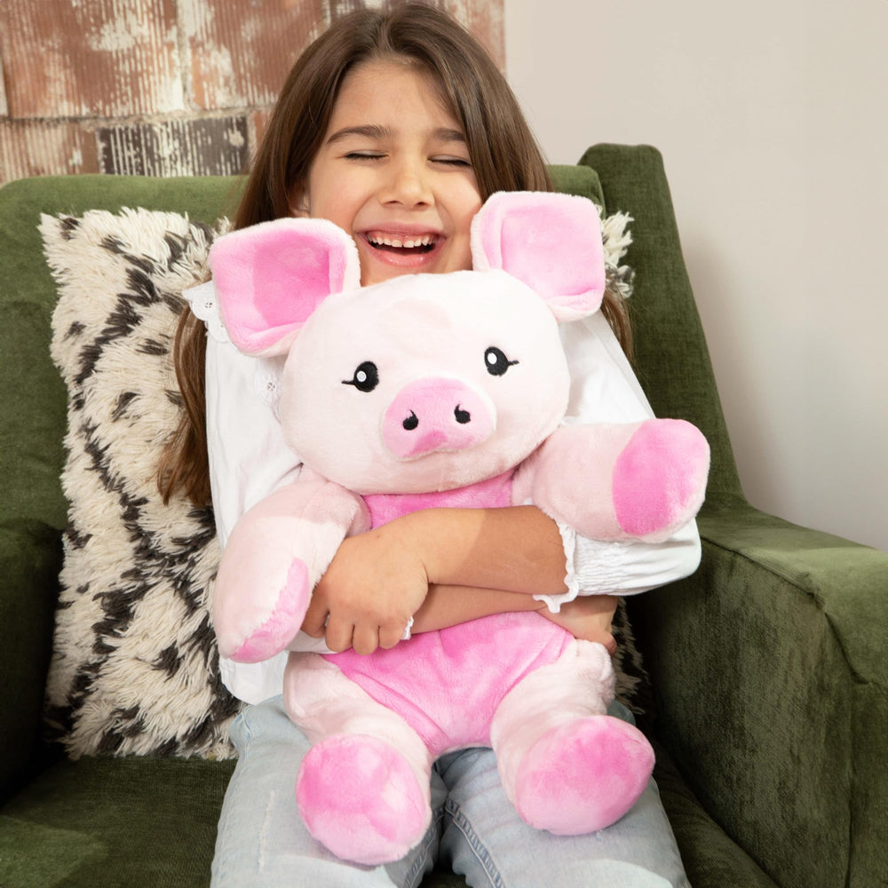 Close-up of Harper the Pig's soft plush fabric for comforting touch