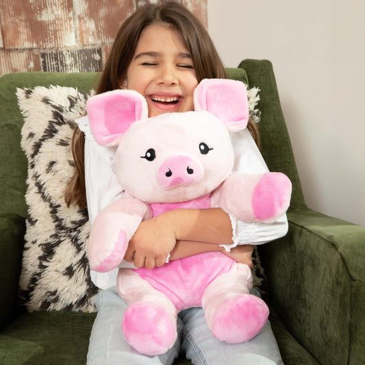 Close-up of Harper the Pig's soft plush fabric for comforting touch
