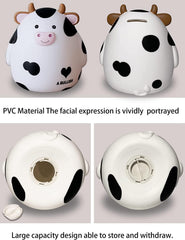 H&amp;W cow piggy bank as nursery décor accent in a playroom