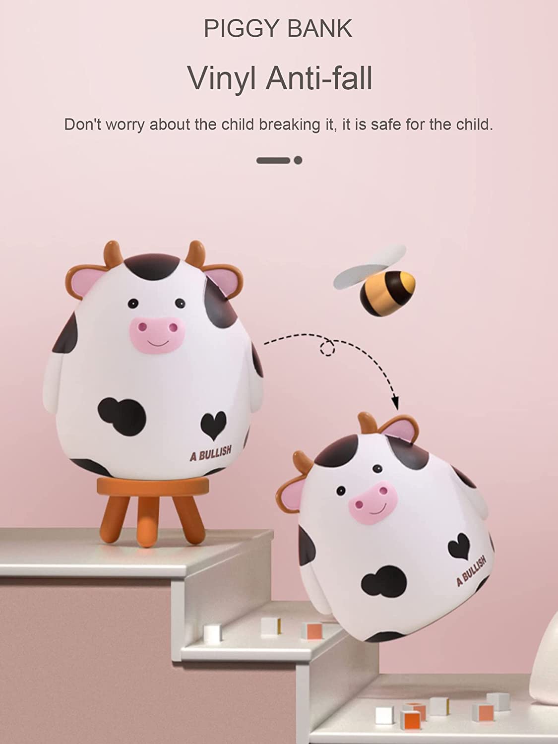 H&amp;W child holding the M Size piggy bank for safe money practice