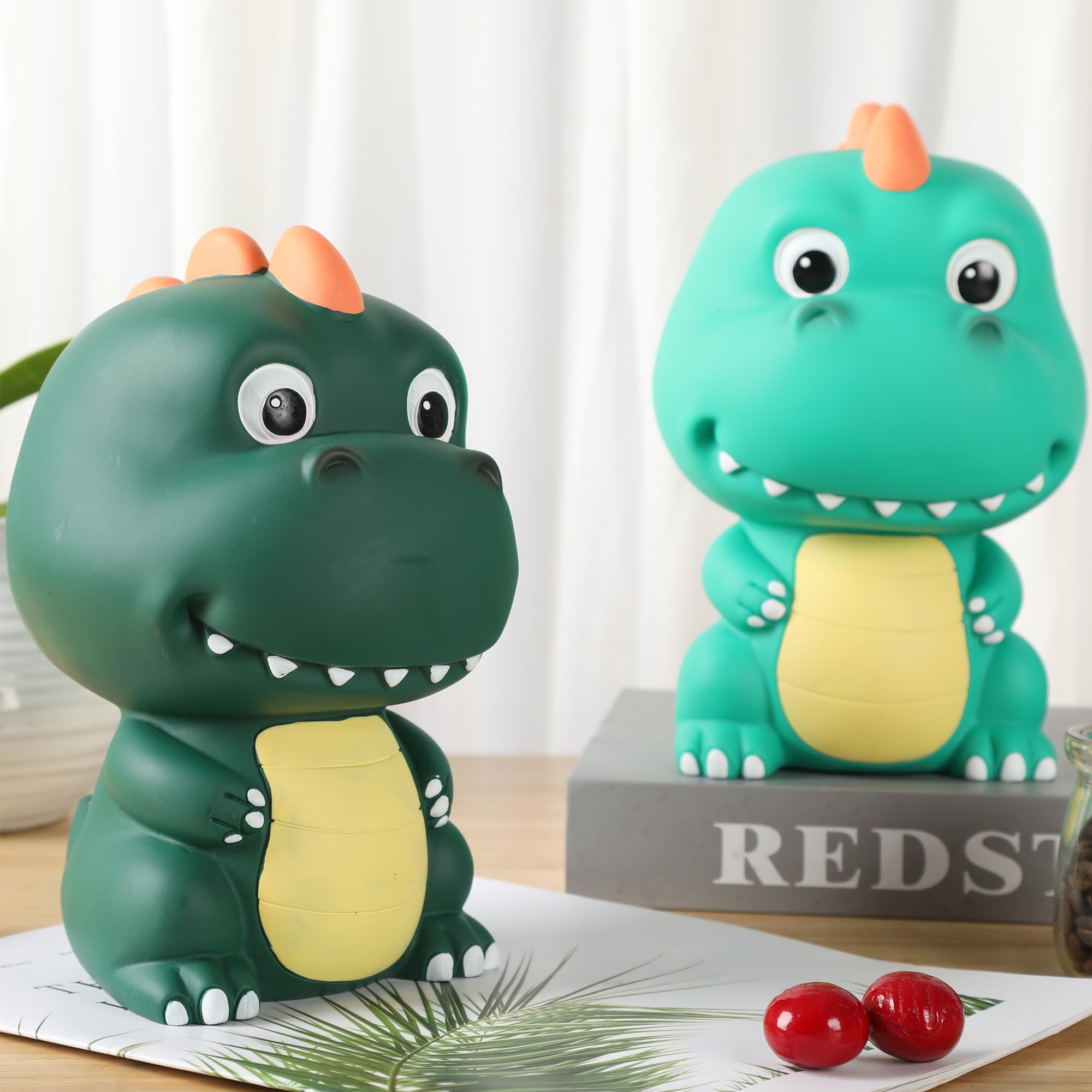 Deep green H&W dinosaur bank fits modern decor