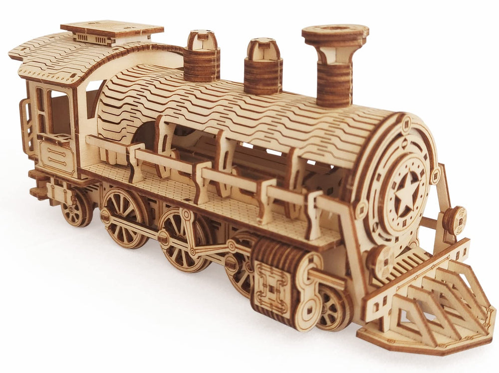 i-CHONY steam train parts layout showing laser-cut pieces ready for assembly