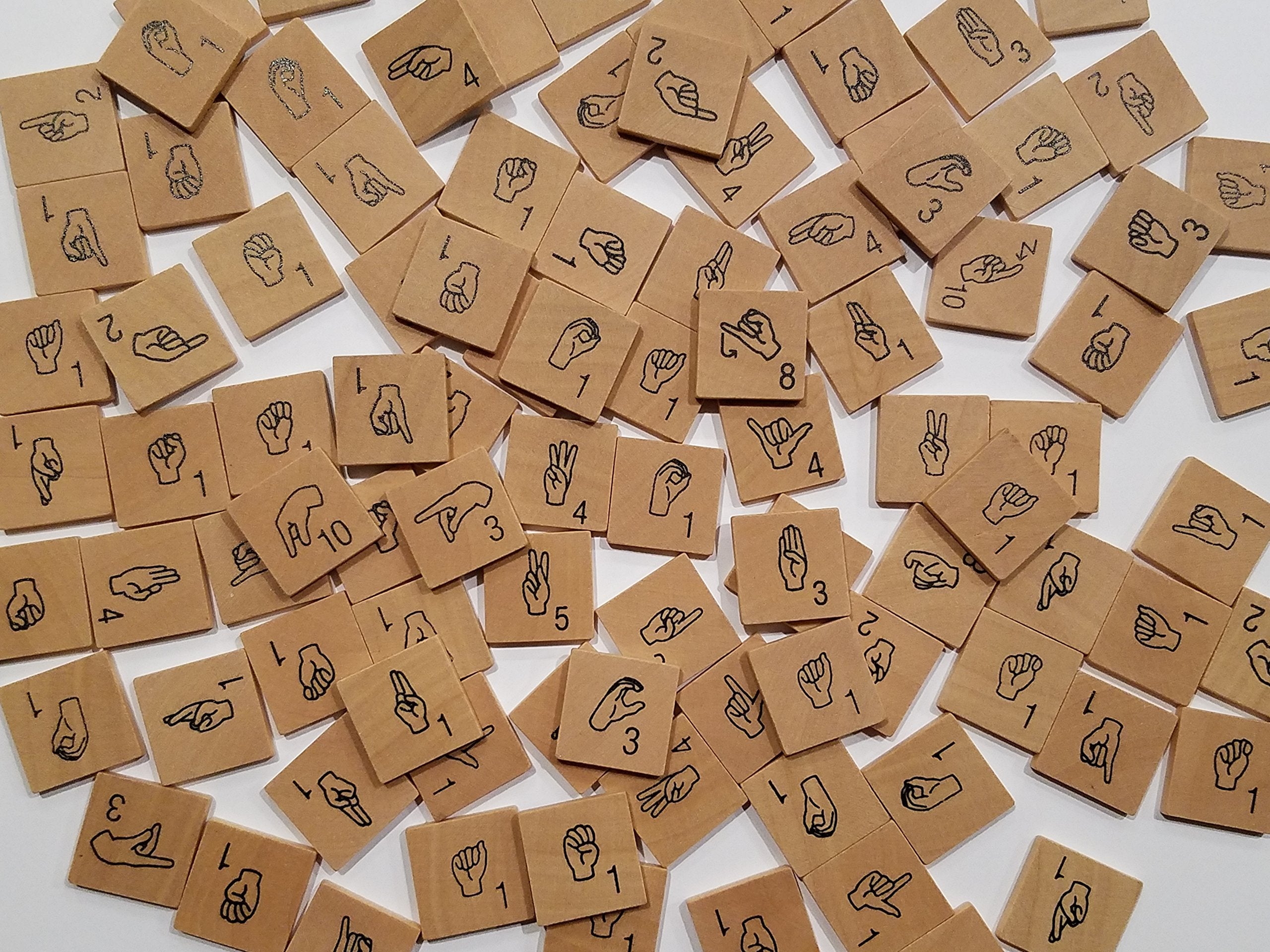 Iconoglyph ASL game tiles front view, engaging home ASL practice.