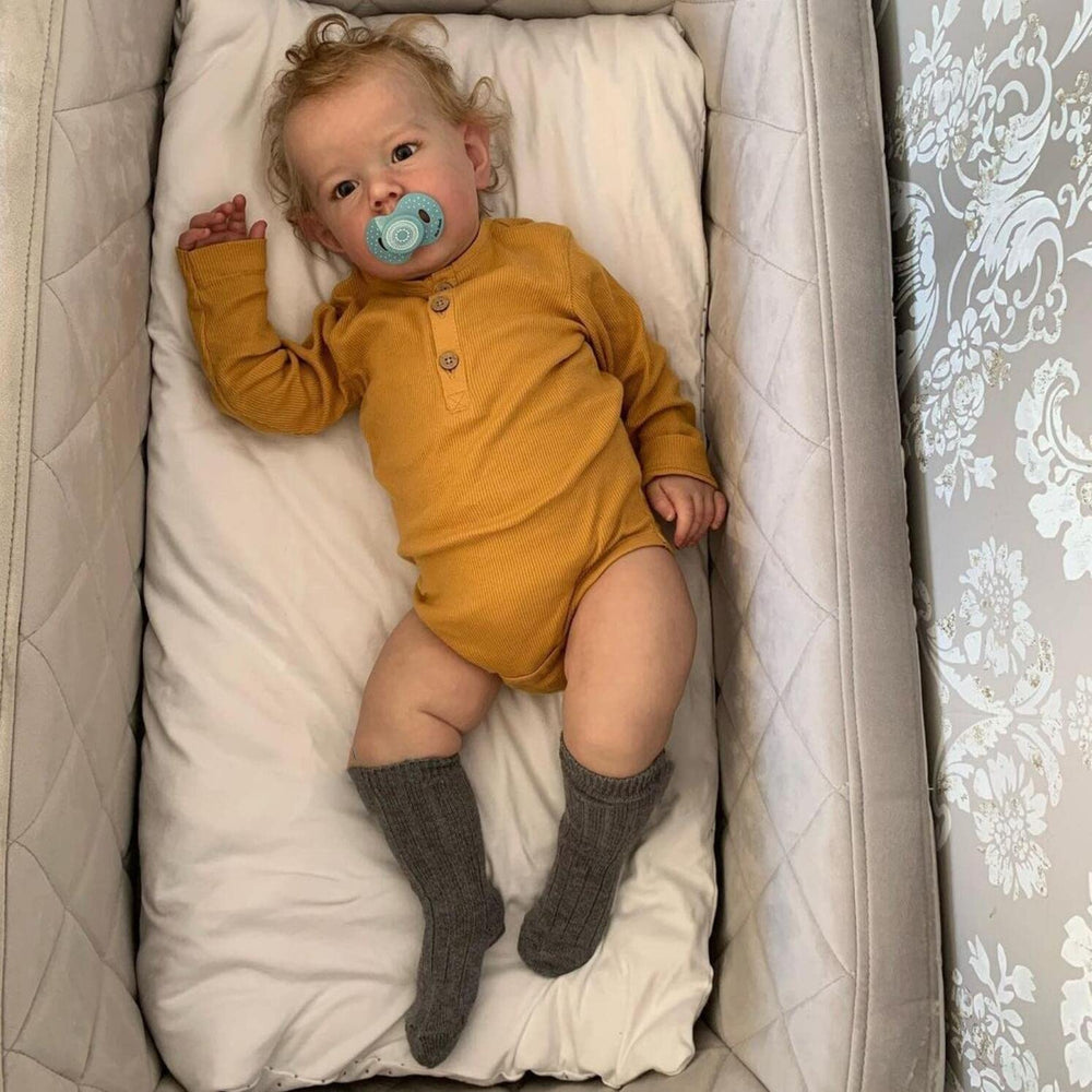 iCradle Reborn Boy doll in soft silicone vinyl for realistic touch