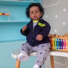 iCradle Reborn Boy Doll outfit showcase for versatile play looks.