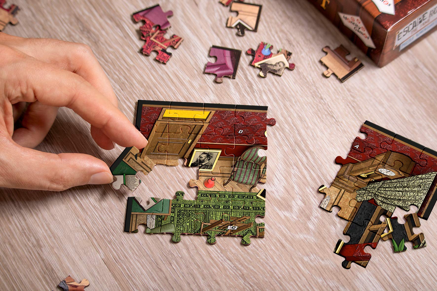 Identity Games room three puzzle pieces depict part of the mansion mystery.