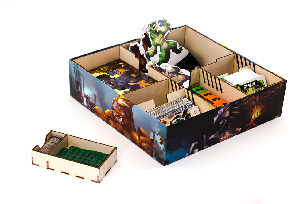 IELLO King of Tokyo space penguin figure inside the box adds playful charm