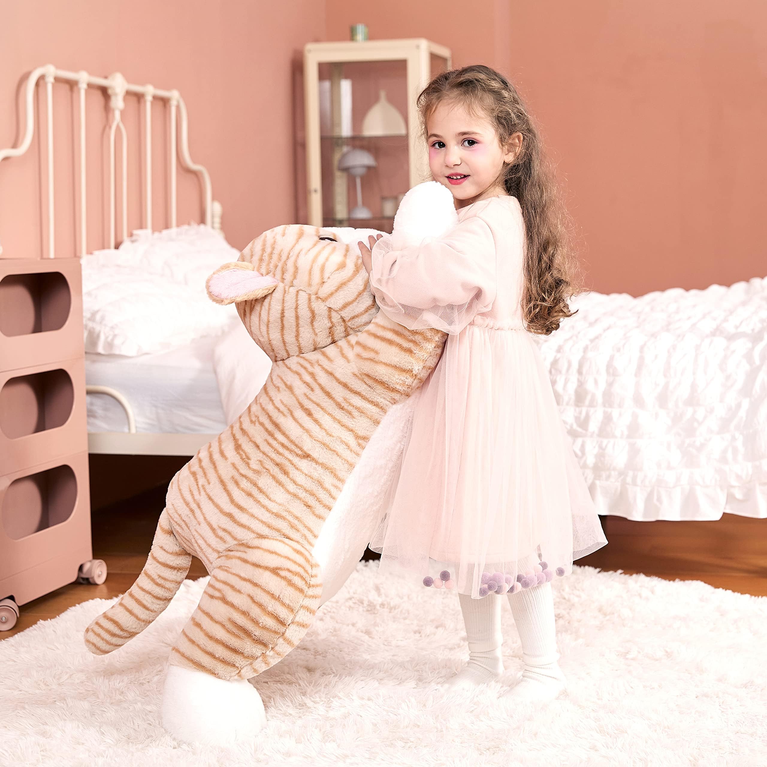 IKASA giant orange cat plush, in child's bedroom, spark imagination and comfort.