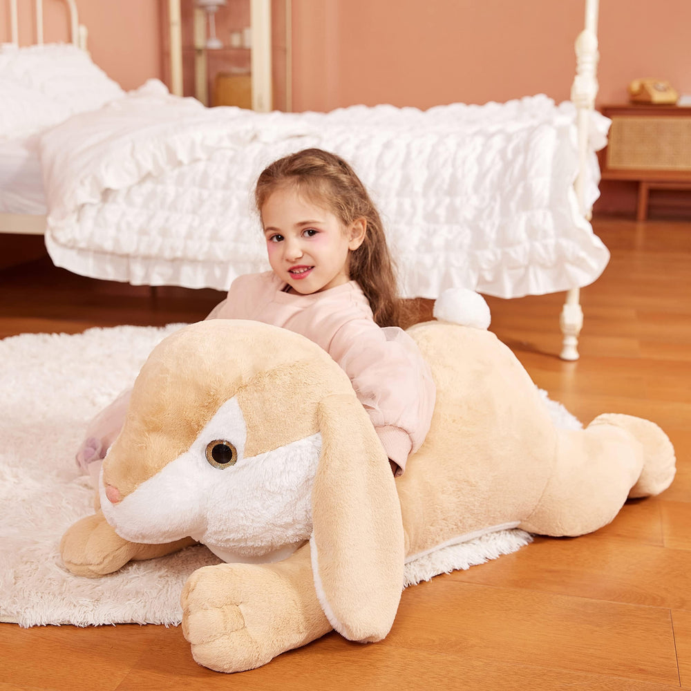 IKASA Giant Rabbit ready for bedtime snuggle on a child’s bed