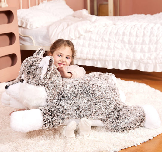 Close-up of IKASA wolf plush texture inviting hugs