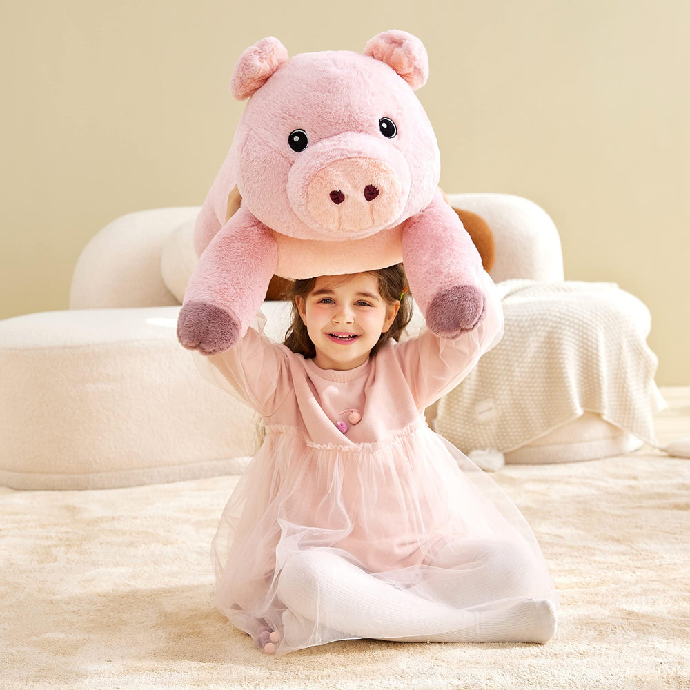 Surface-cleaning friendly IKASA pig plush with easy care instructions.