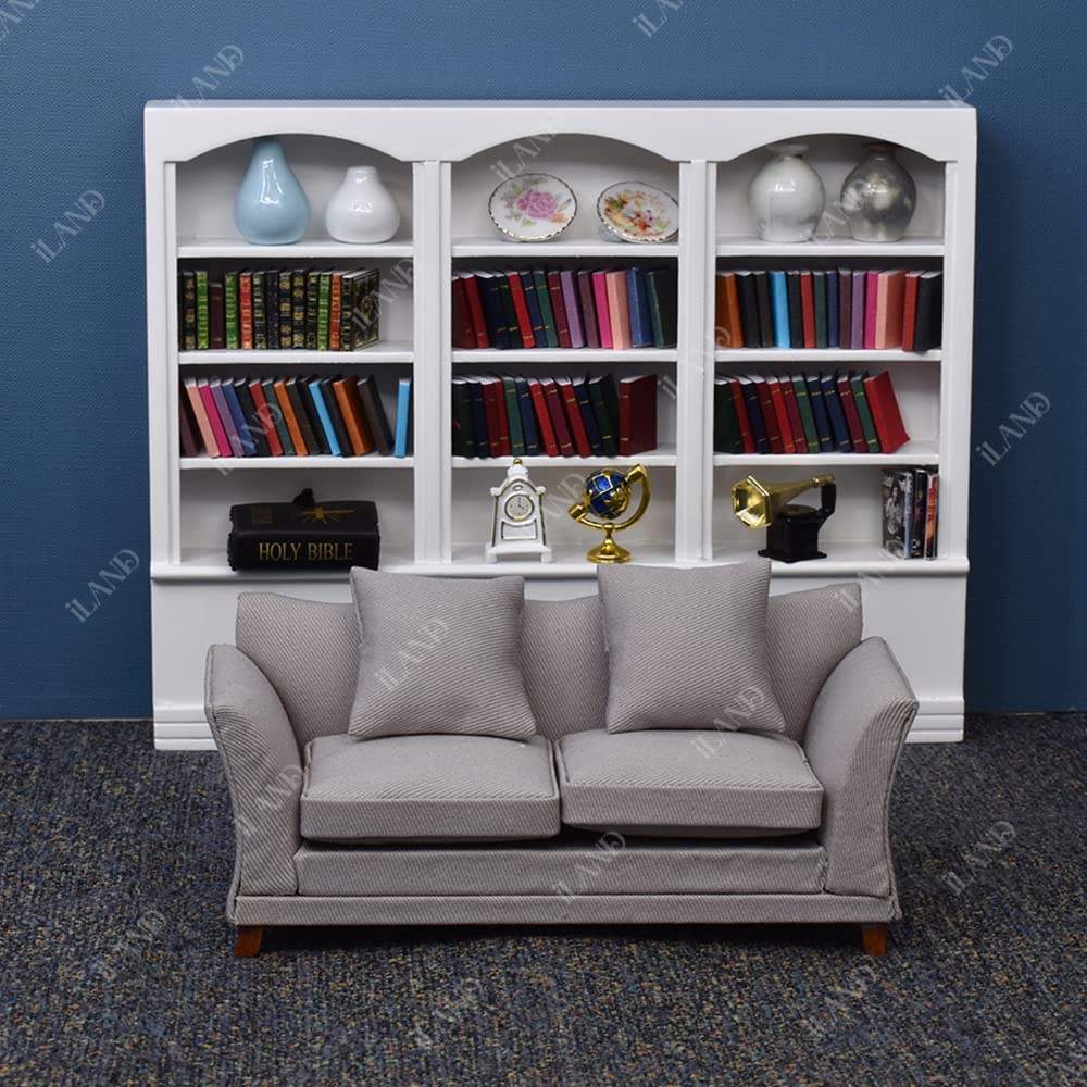 iland dollhouse sofa with wavy profile—handcrafted finish and elegant silhouette.