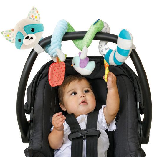 Infantino spiral activity toy wrapped on stroller handle for engaging on-the-go play