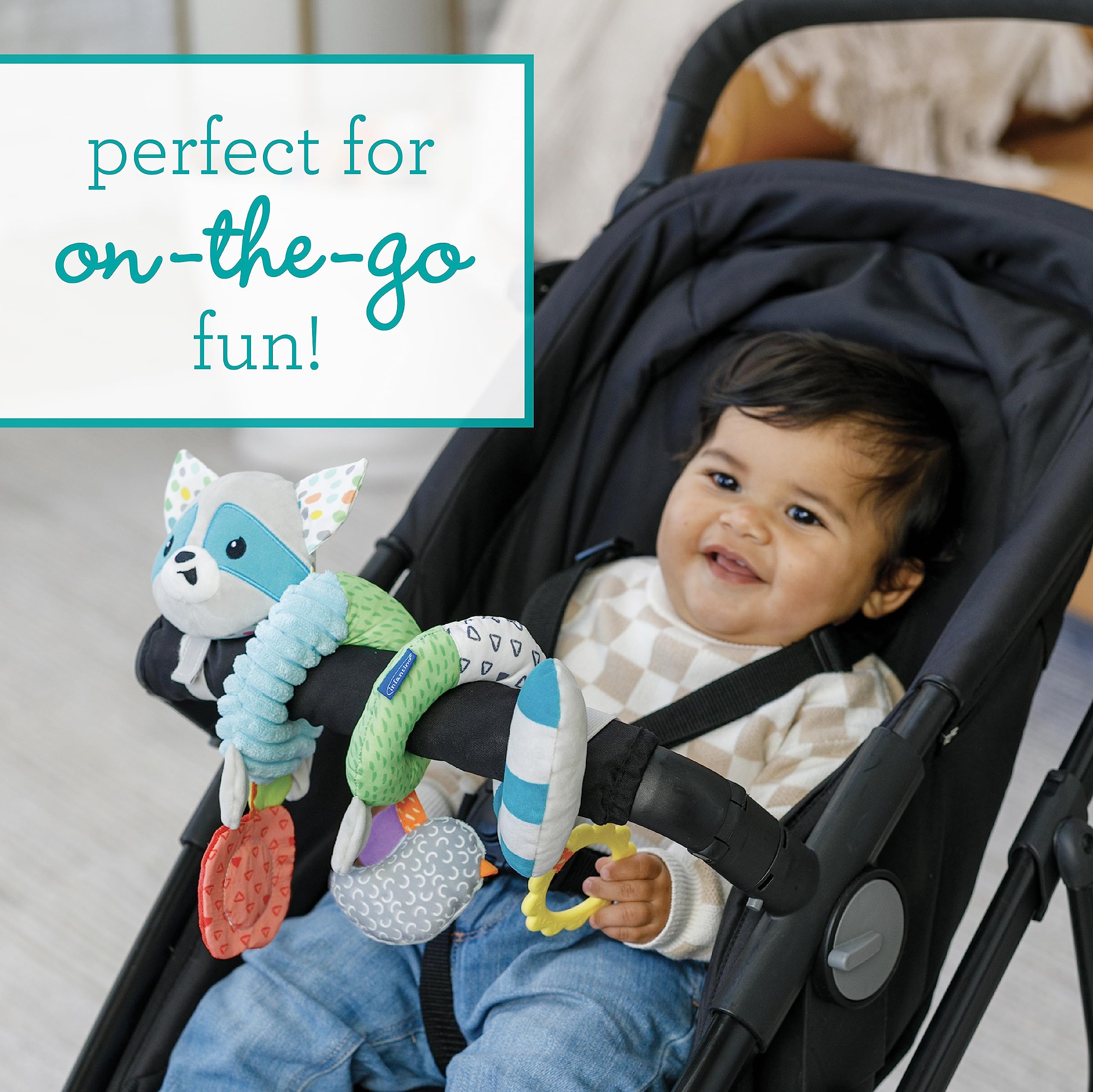 Infantino spiral fabric textures provide rich tactile exploration during strolls