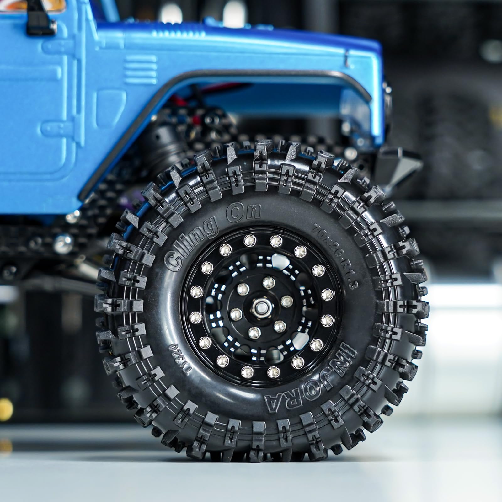 INJORA 1.3 inch micro crawler tires suitable across scales when mounted.