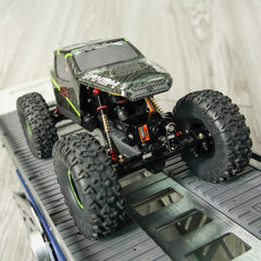 INJORA 51mm shocks at 27mm compressed length for compact fit.