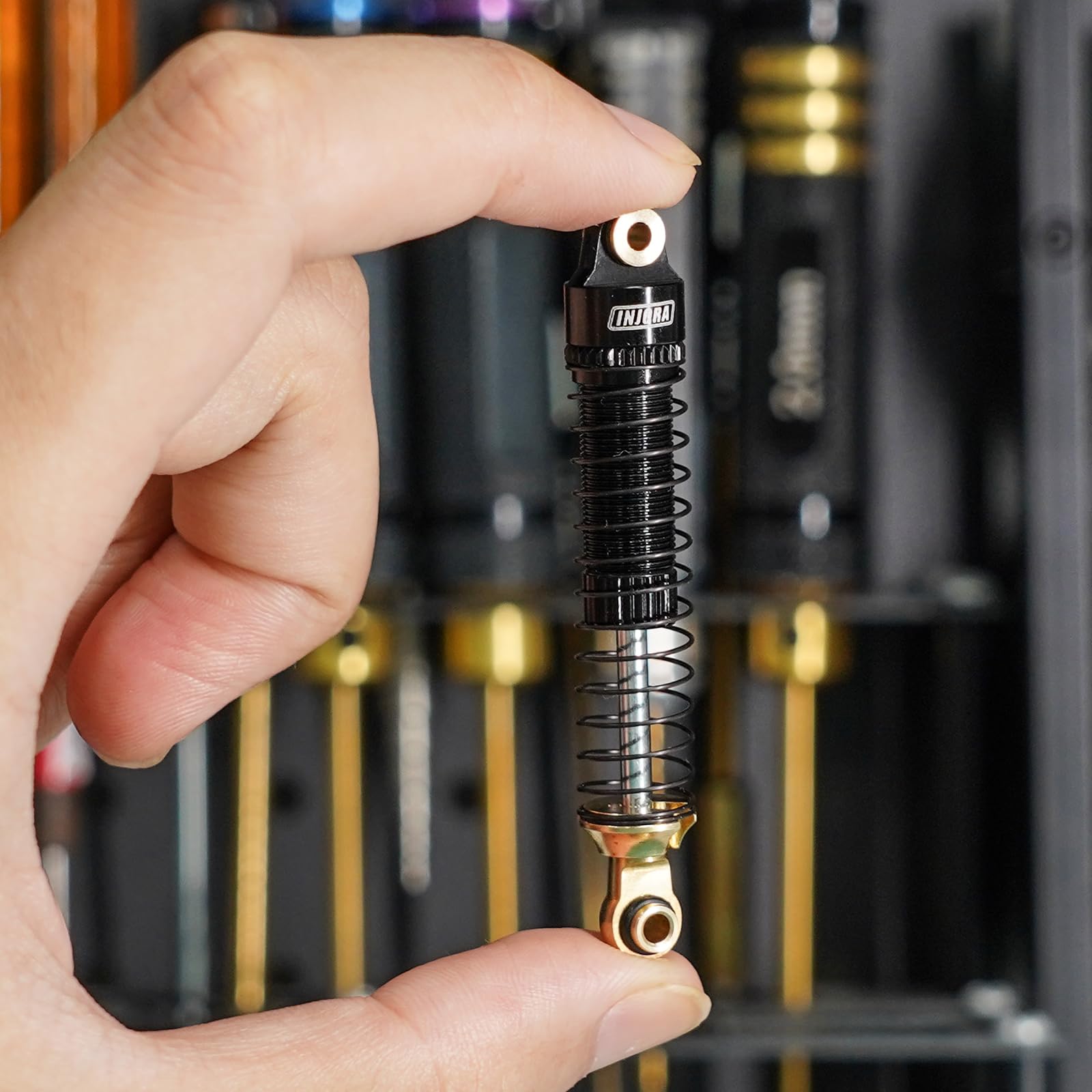 INJORA 59mm shocks threaded-adjustment close-up enables easy preload customization.