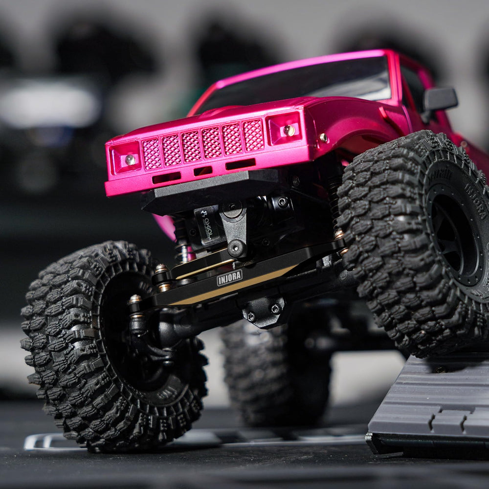 INJORA brass steering links installed on Axial SCX24 with precise CNC joinery