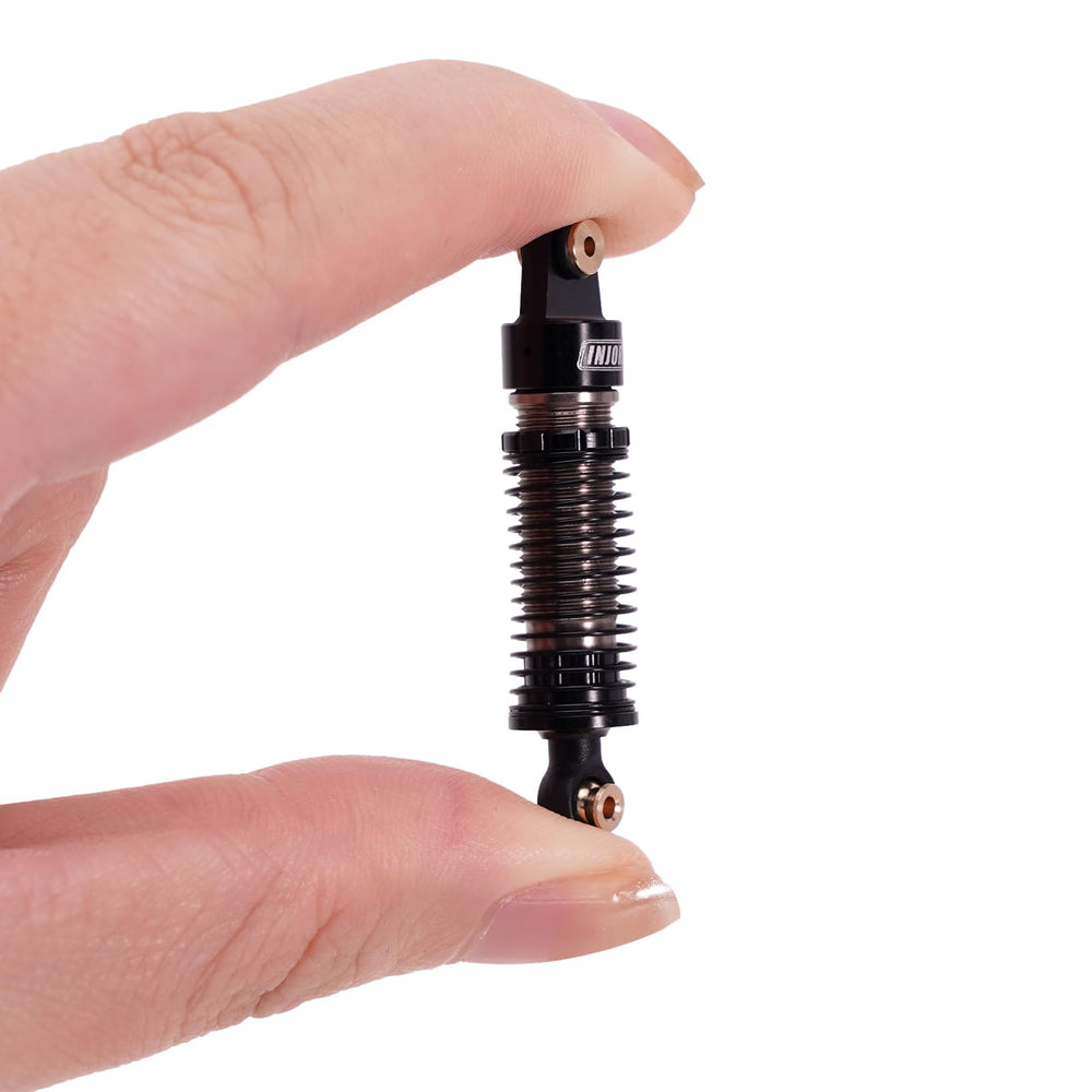 INJORA complete AX24 shock pack for scalable crawler builds