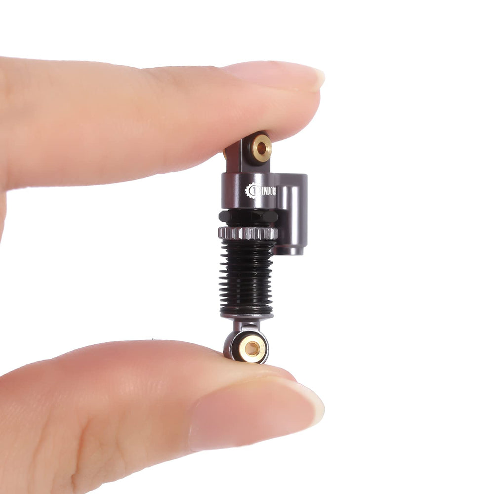 INJORA grey finish dampers deliver durable appearance and reliable performance.