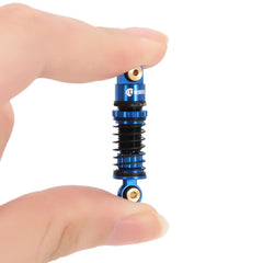 INJORA RC crawler shocks upgrade travel for better stability on rough terrain, blue.