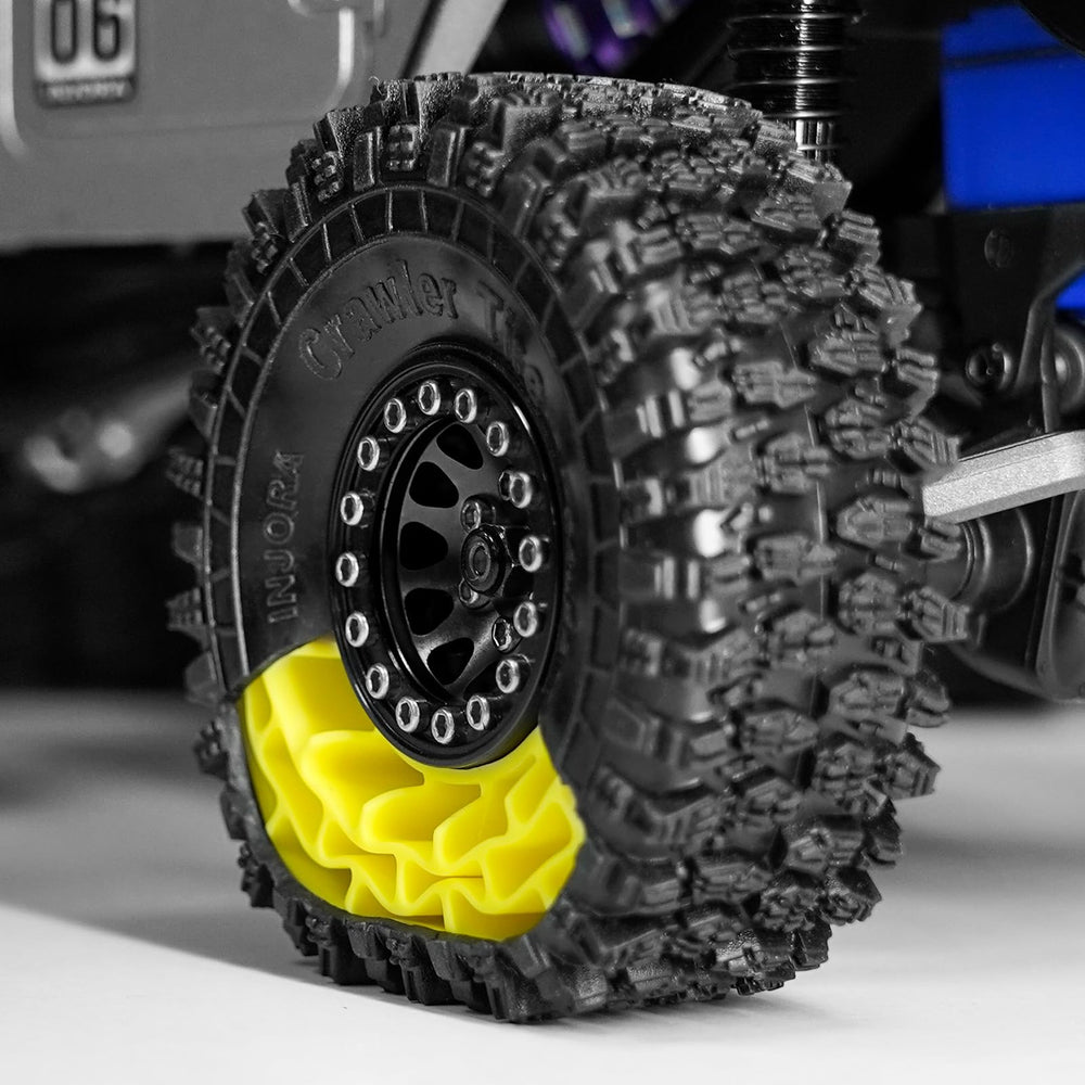 INJORA scale-detail tire close-up for authentic RC crawler look