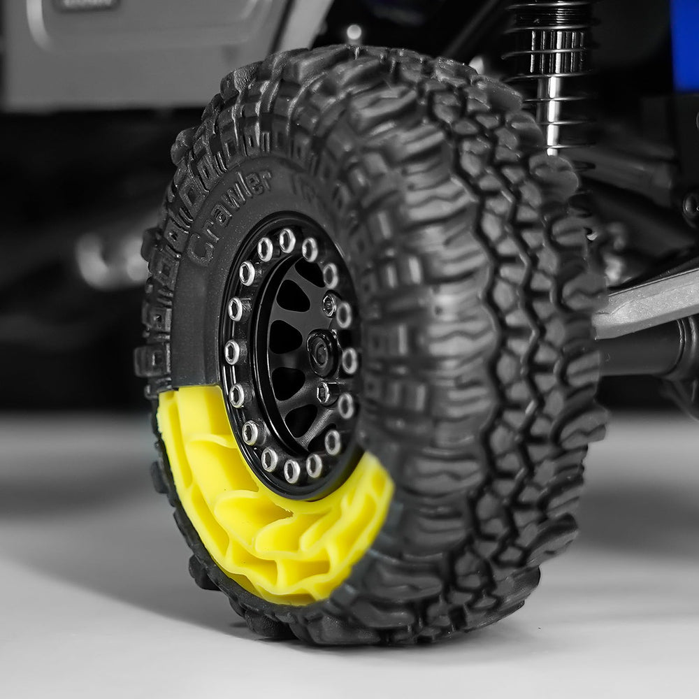 INJORA assembled tire with inserts on a crawler chassis for improved grip