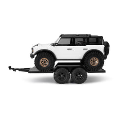Versatile trailer for towing and transporting RC gear on trail runs.