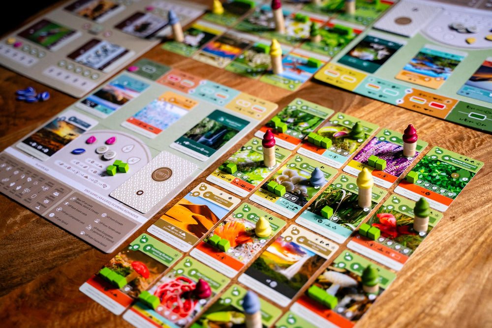 Inside Up Games Earth: Abundance event card sparks resource flow.